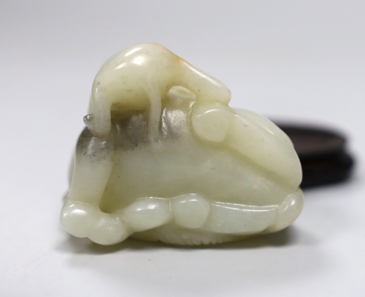 Chinese white jade carving of a monkey and elephant, with wooden stand - 8cms wide and a Chinese bronze figure